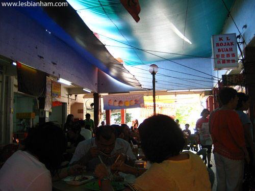 A buzzing food court (more like a food alley). Things start getting busy at around 9 AM.